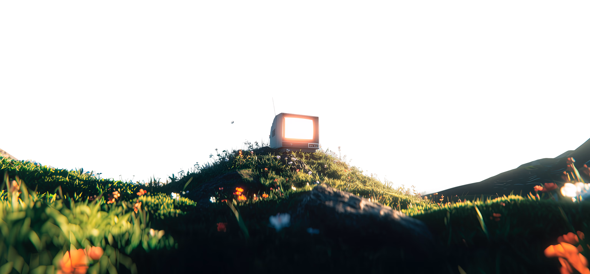 A retro computer in a sunlit green landscape